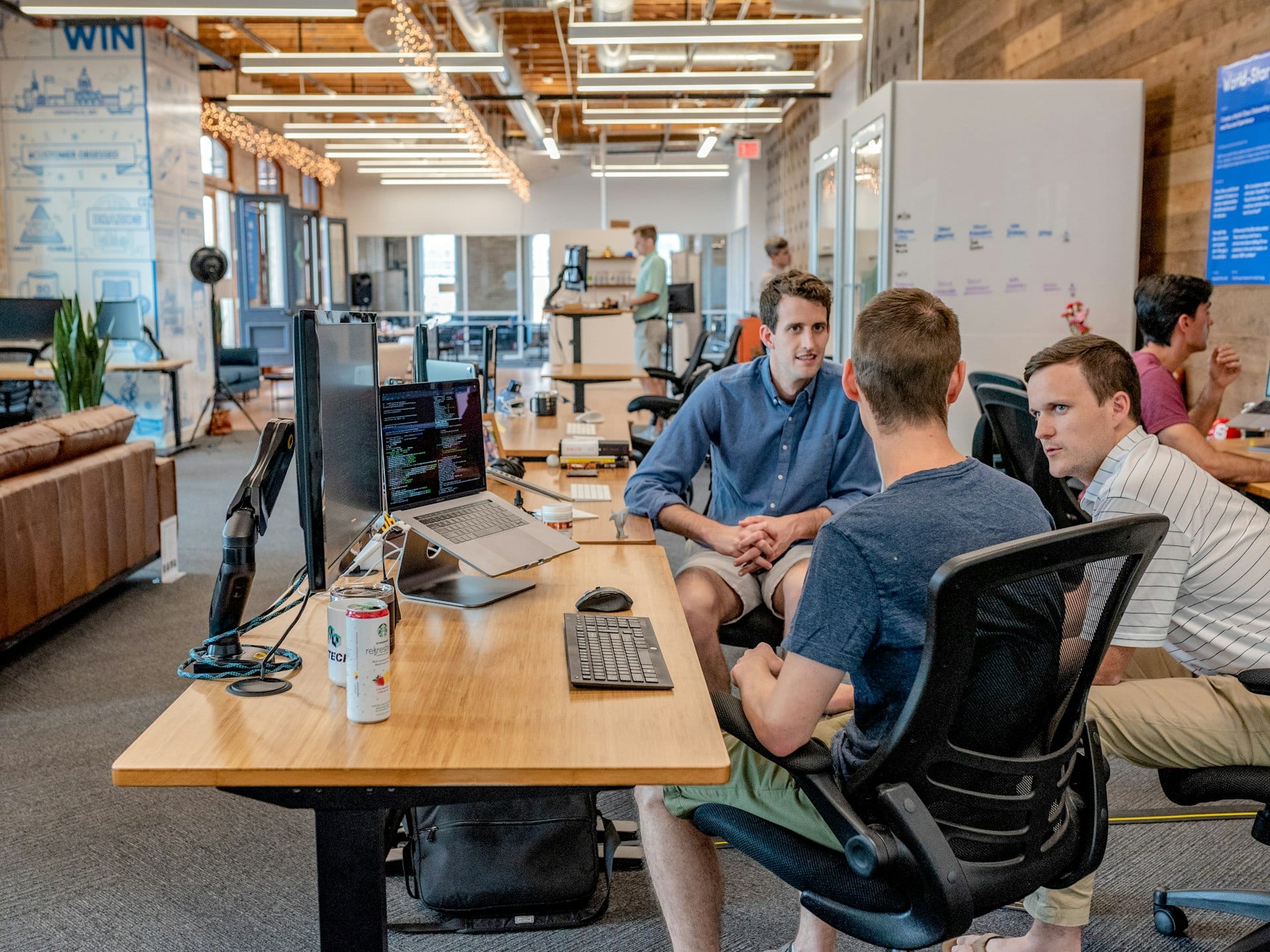 Business team collaborating around operational challenges